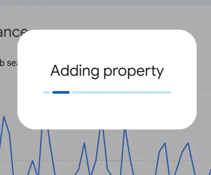 Search Console briefly displays an "Adding property" progress indicator while the Instagram account is linked.
